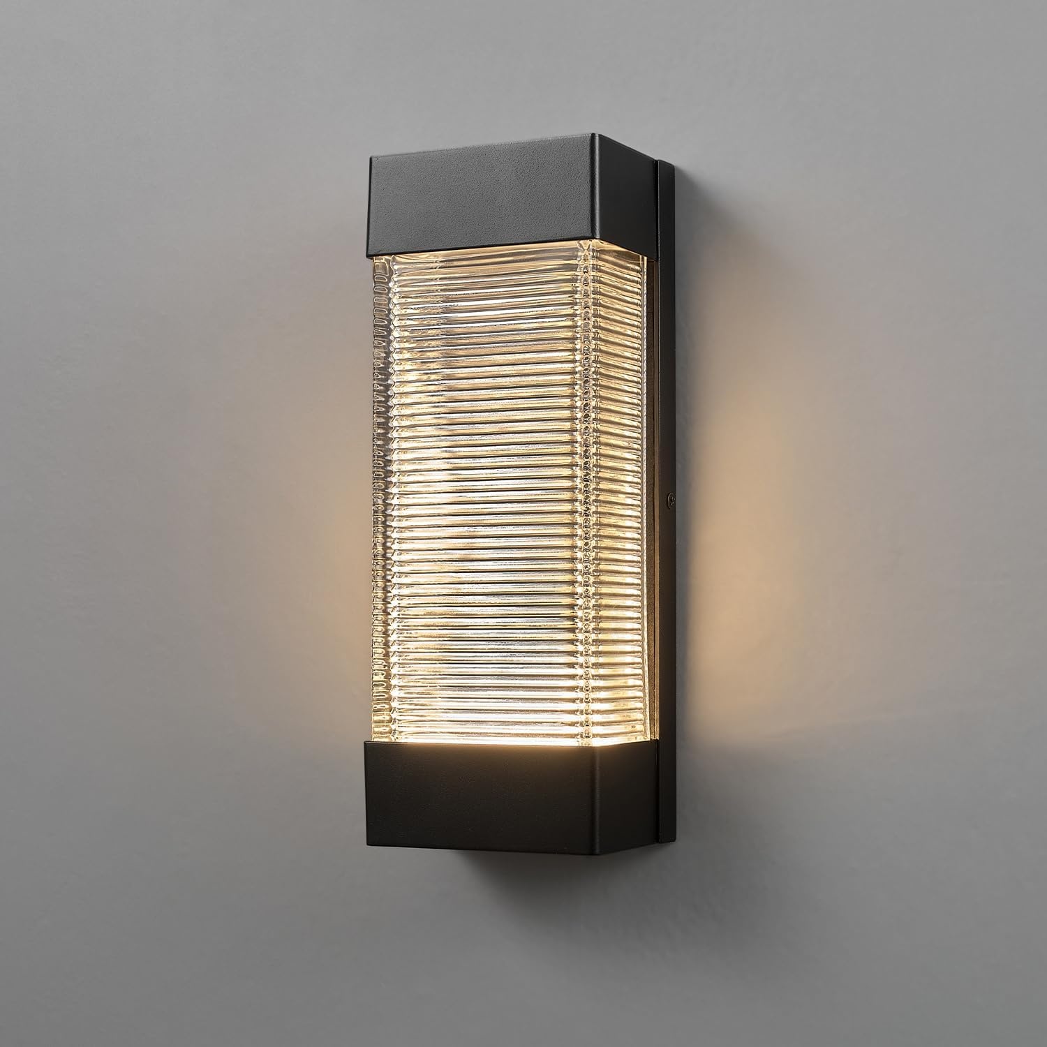 image:imageGlobe Electric 44359 Capulet LED Integrated Outdoor Indoor Wall Sconce Black Clear Bubble Glass Center Column Dimmable 12W 850 LumensMatte Black Ribbed Glass